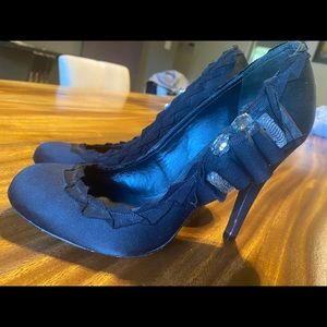 Black satin Tory Burch jeweled round toe pumps. Size 39